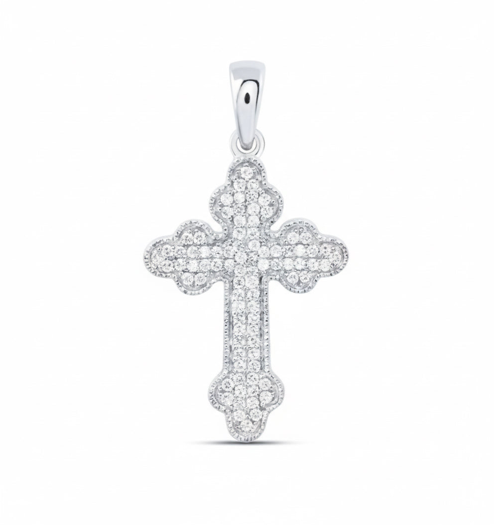 Silver cross pendant with small stones on a white background