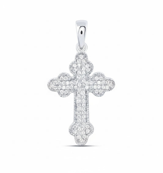 Silver cross pendant with small stones on a white background