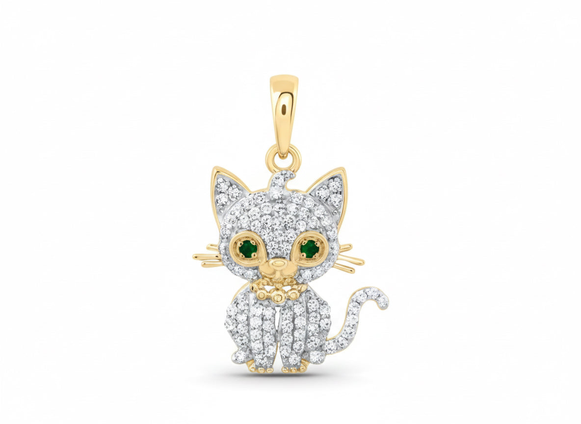 1/6 CTW natural diamond cat pendant in 10K gold with emerald accent