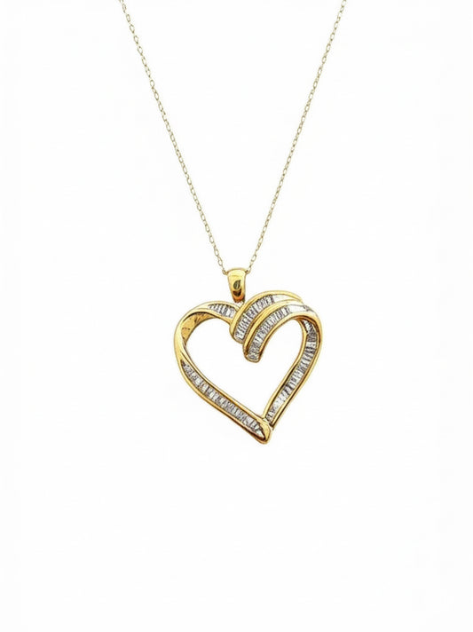 10K gold heart-shaped charm with baguette-cut diamonds and 18-inch chain