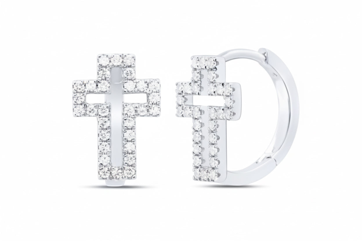 Dainty gold cross huggie earrings with ethically sourced diamonds