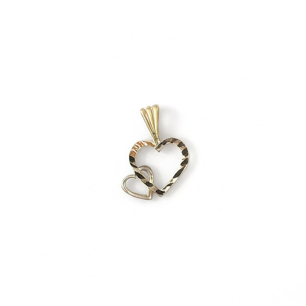 Heart-shaped pendant with gold and tortoiseshell design on a white background