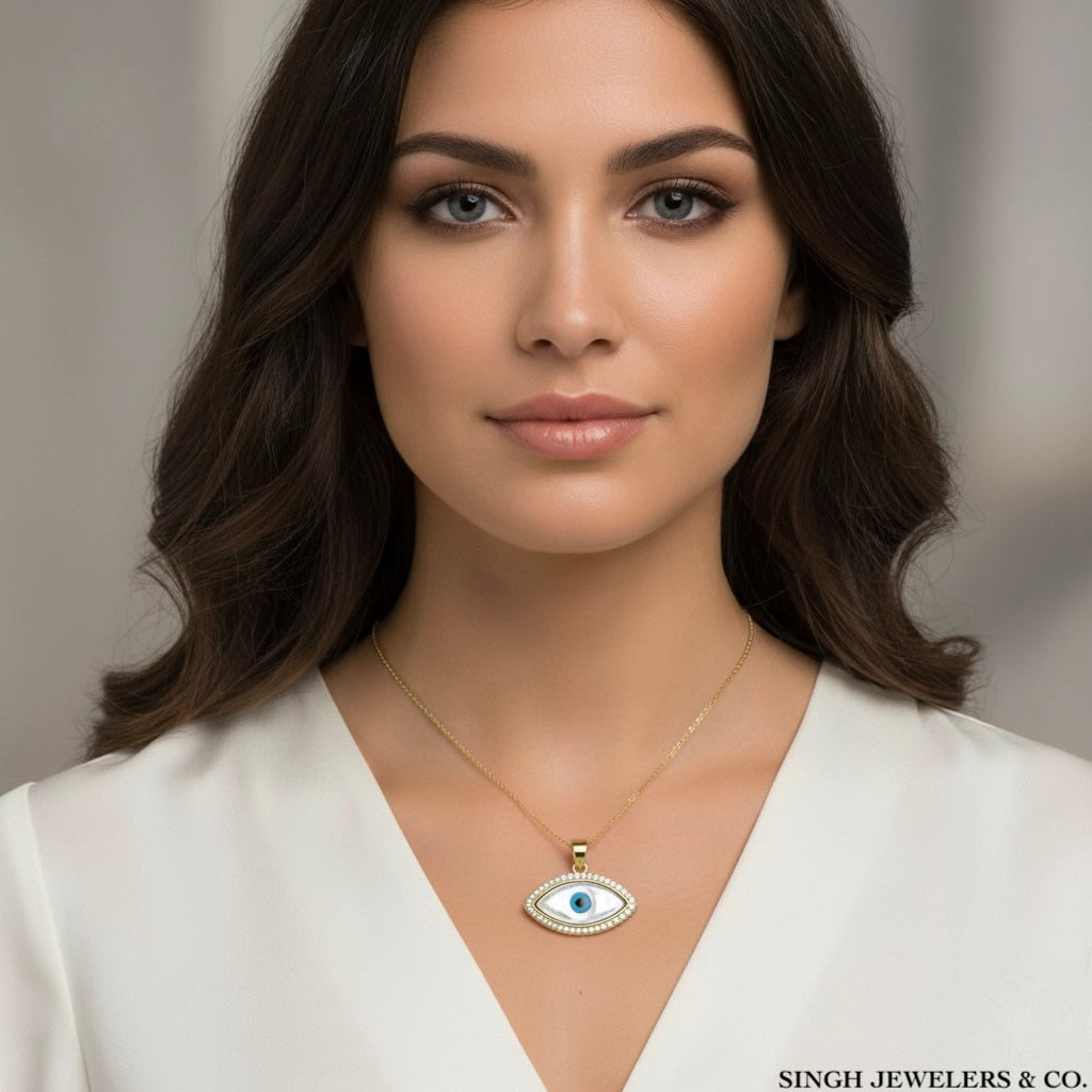 10k gold evil eye pendant on model