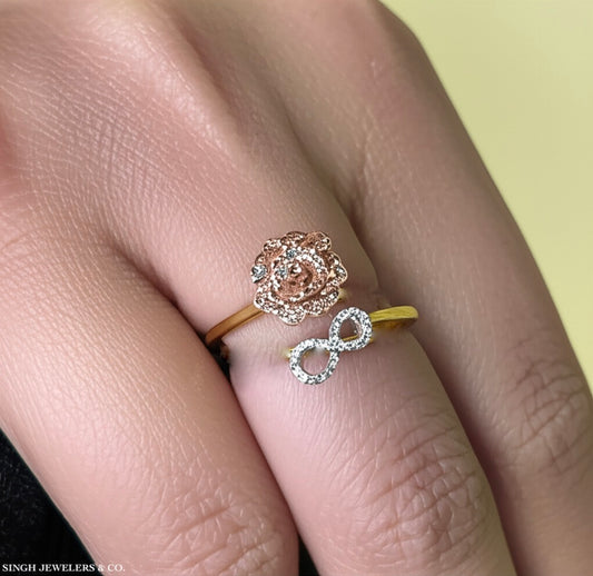 Delicate infinity diamond ring in rose and yellow gold, worn on finger