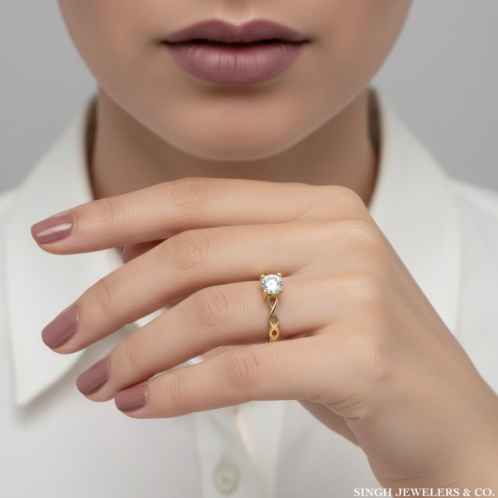 Infinity symbol promise ring in 10K gold on hand