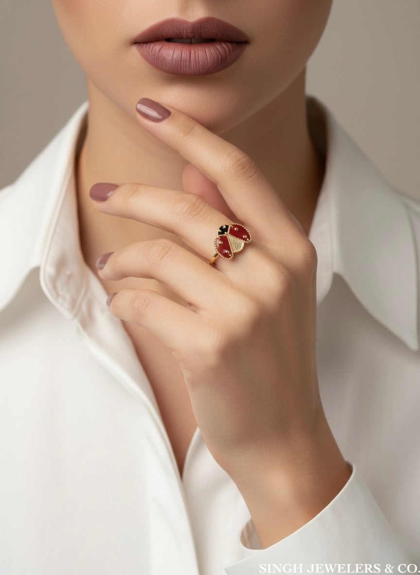 Model wearing a 10K gold ladybug ring