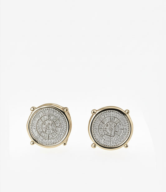 Close-up of pavé setting round diamond studs in gold