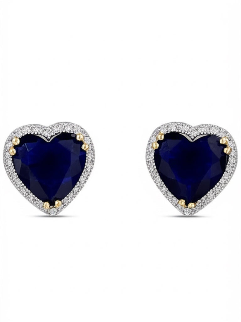 Close-up of blue sapphire and diamond heart earrings in 10K gold