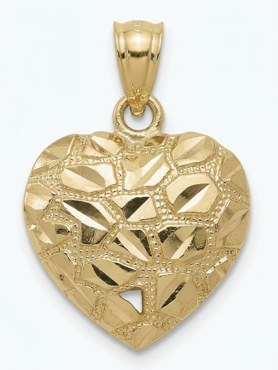 10K solid gold diamond-cut heart nugget charm with a textured gold finish front side of the charm