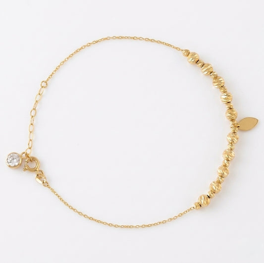 10K Turkish diamond cut yellow gold anklet with white sapphire