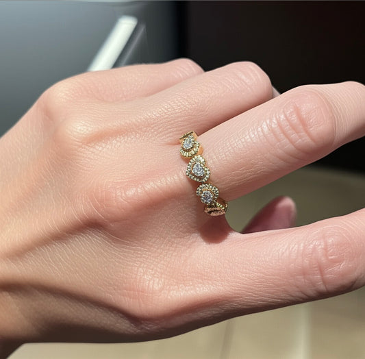 10K yellow gold diamond ring with alternating hearts design