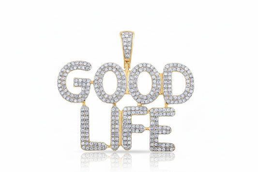 Gold and silver 'GOOD LIFE' pendant on a white background
