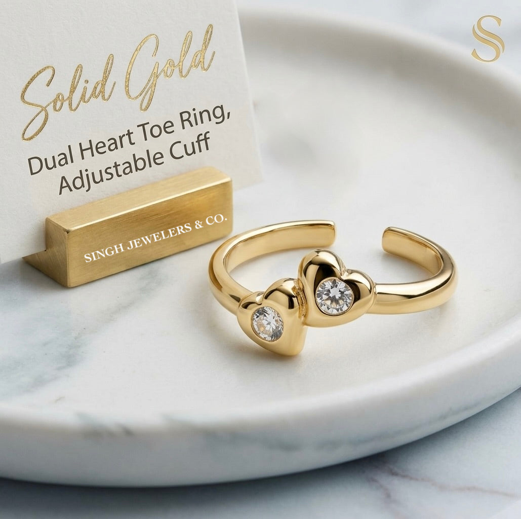 10K yellow gold double heart cubic zirconia toe ring for women on display