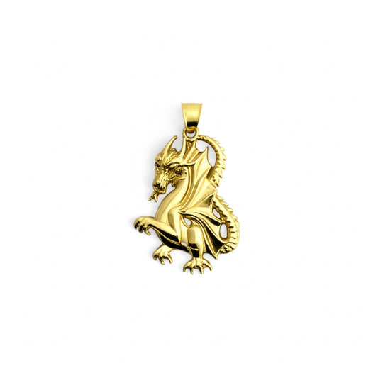 Gold dragon pendant on a white background