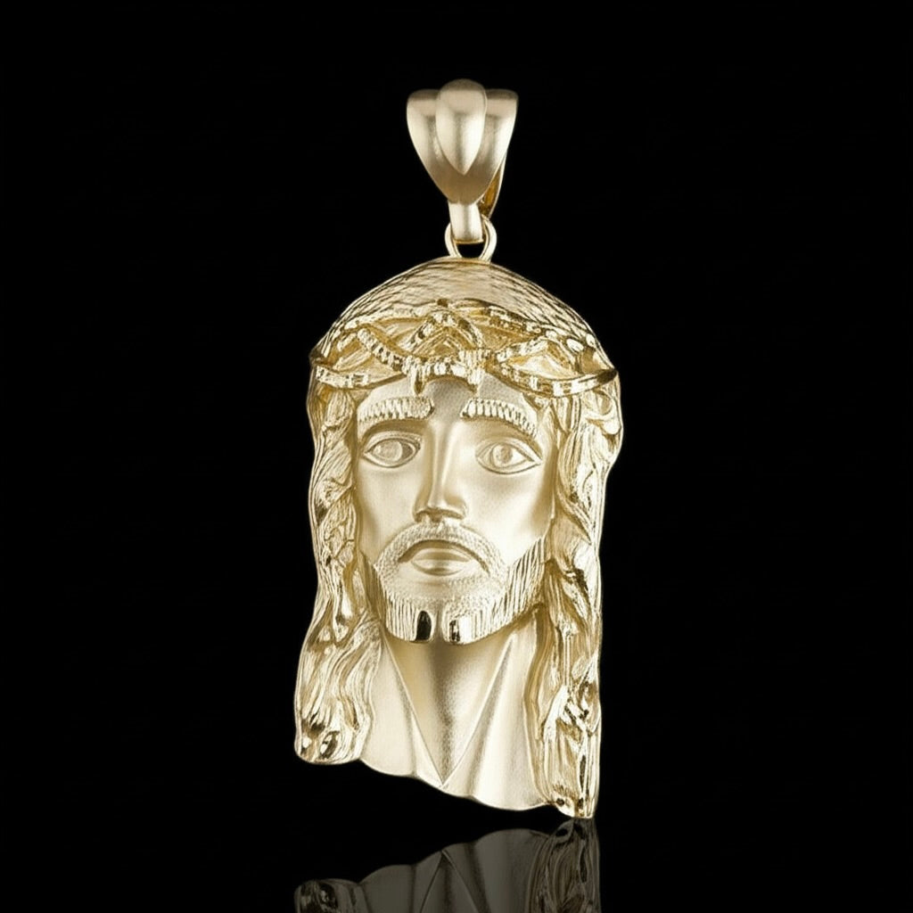 10K yellow gold matte finish Jesus pendant with detailed religious design