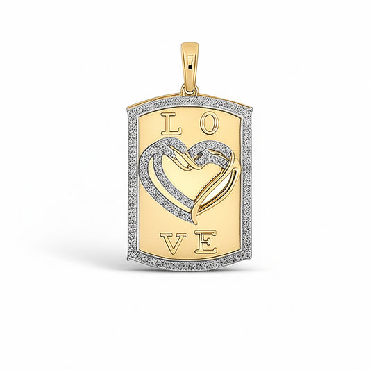 Close-up of a 10K yellow gold dog tag heart pendant from Nicole’s Dream Collection, adorned with 5/8 CTTW sparkling round diamonds.