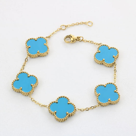 10K yellow gold sky blue clover bracelet, 13mm design, 7.5-inch adjustable size, elegant jewelry piece for women.