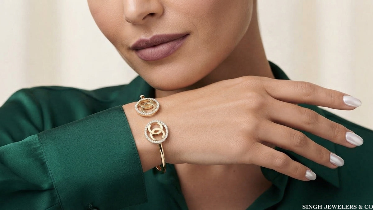 10K yellow gold white sapphire bangle bracelet worn on wrist