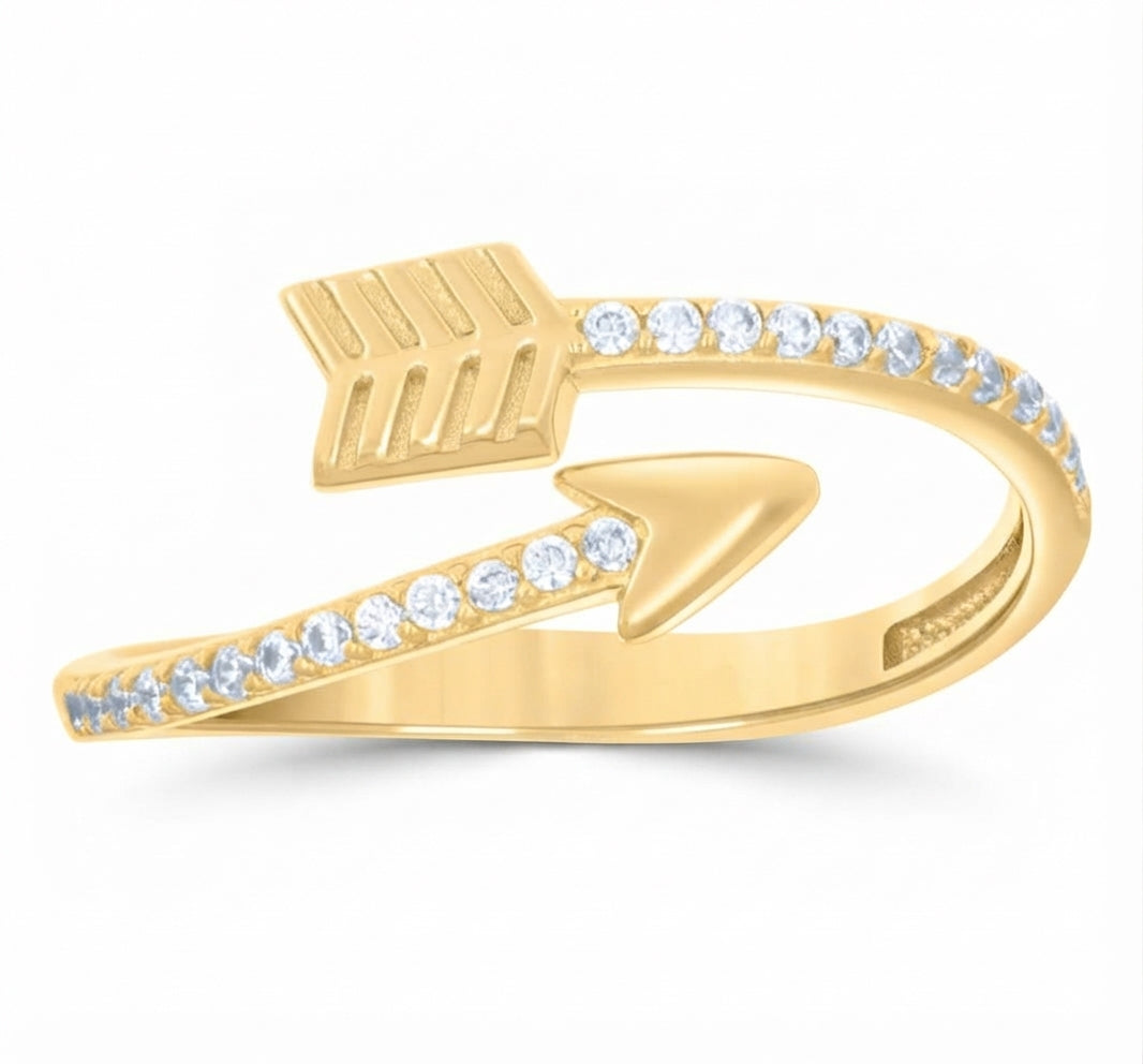 Close-up of cubic zirconia on 10K yellow gold arrow ring