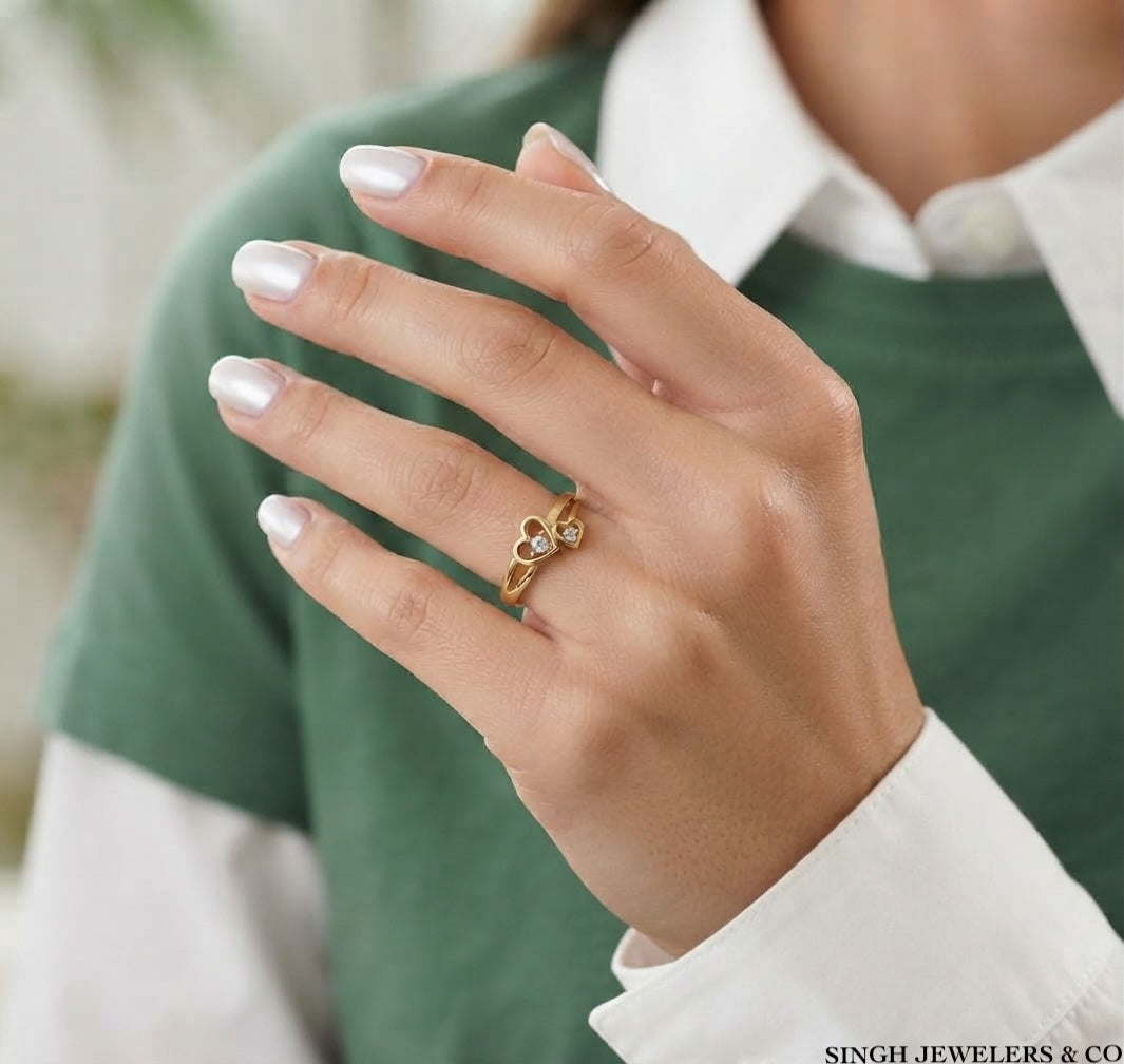 10K yellow gold heart ring with round cubic zirconia
