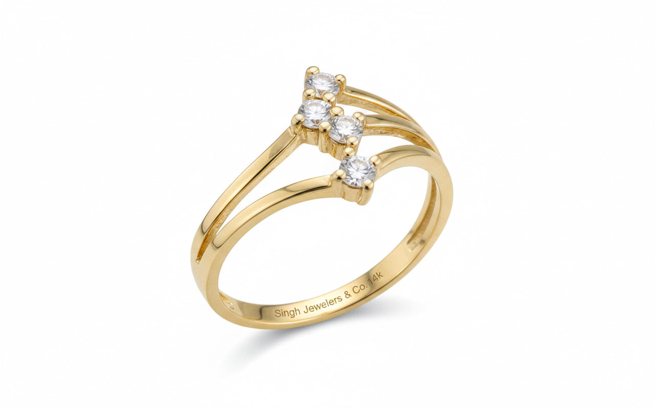 close-up of sparkling cubic zirconia stones on 14k gold layered ring