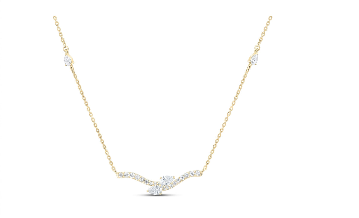 14K gold necklace with natural diamonds and a pear teardrop design, 7/8 carat total weight, 18 inches long