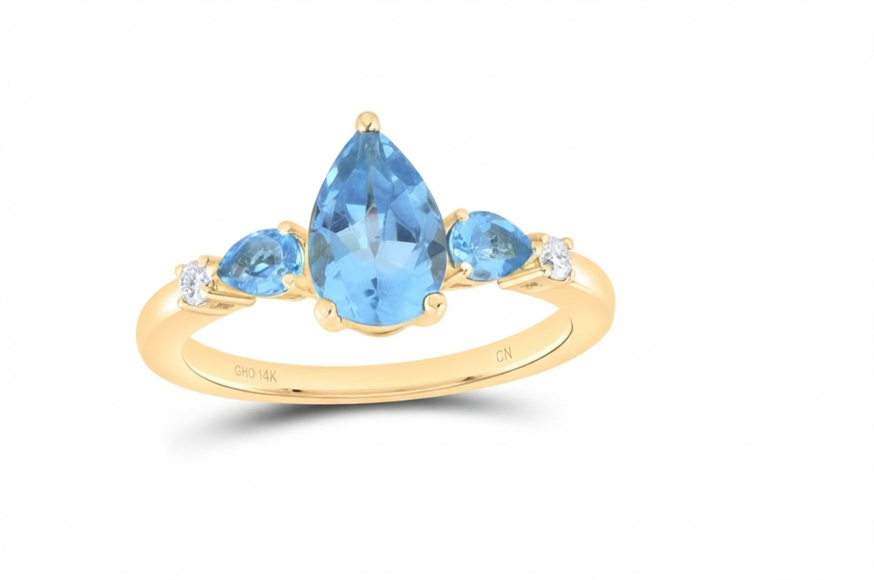14K gold pear-shaped natural blue topaz ring with 1/12 CTW natural diamond accents