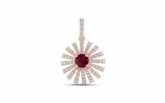 Rose gold pendant with a central red gemstone and diamond-studded rays on a white background