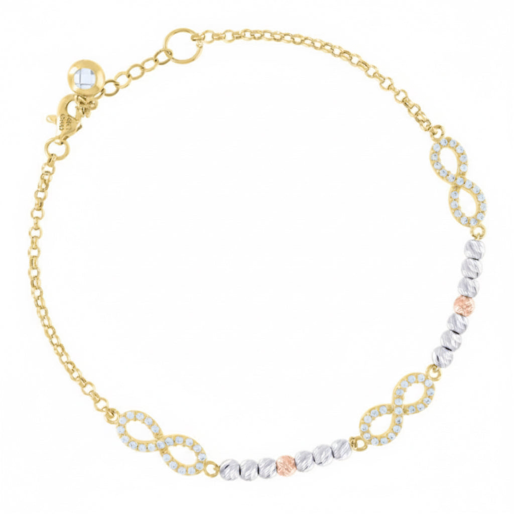 Gold and silver bracelet with interlocking links on a white background