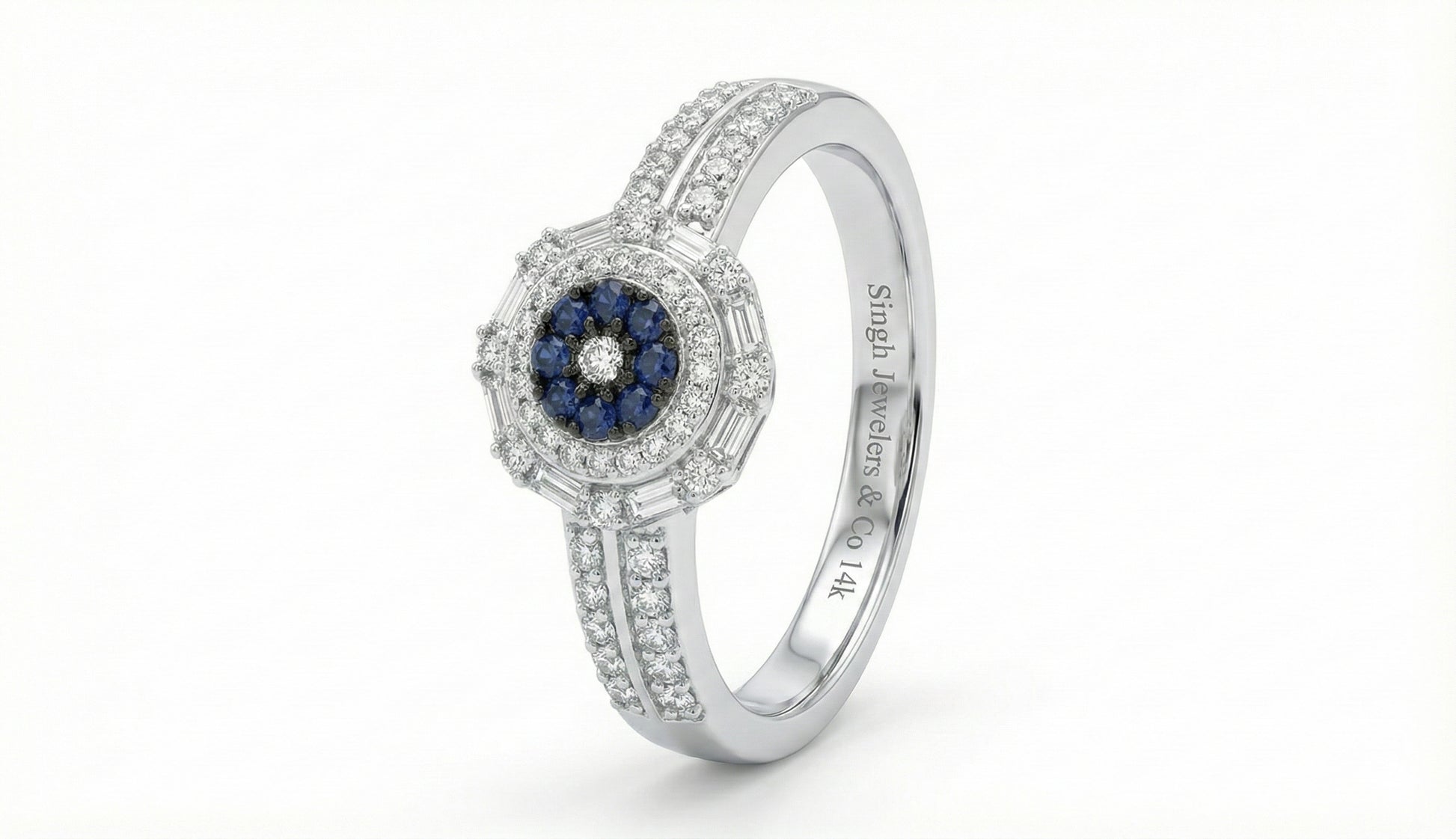 14K white gold ring with round blue sapphire and 1/2 CTTW diamonds.