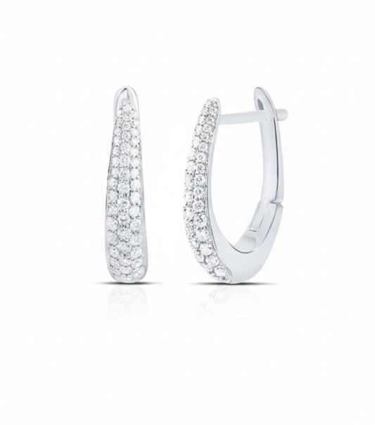 Silver hoop earrings with clear gemstones on a white background