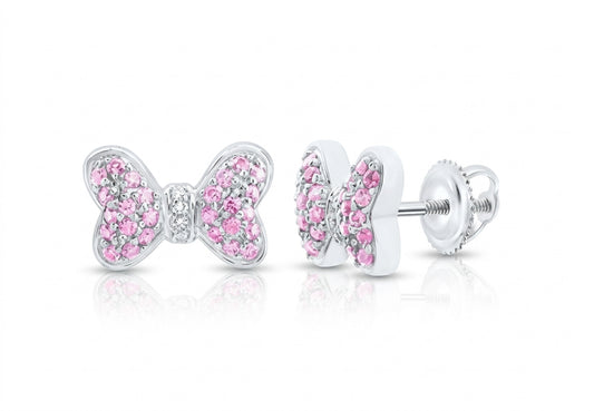 14K white gold pink sapphire and natural diamond bow earrings modeled on the ear on white background