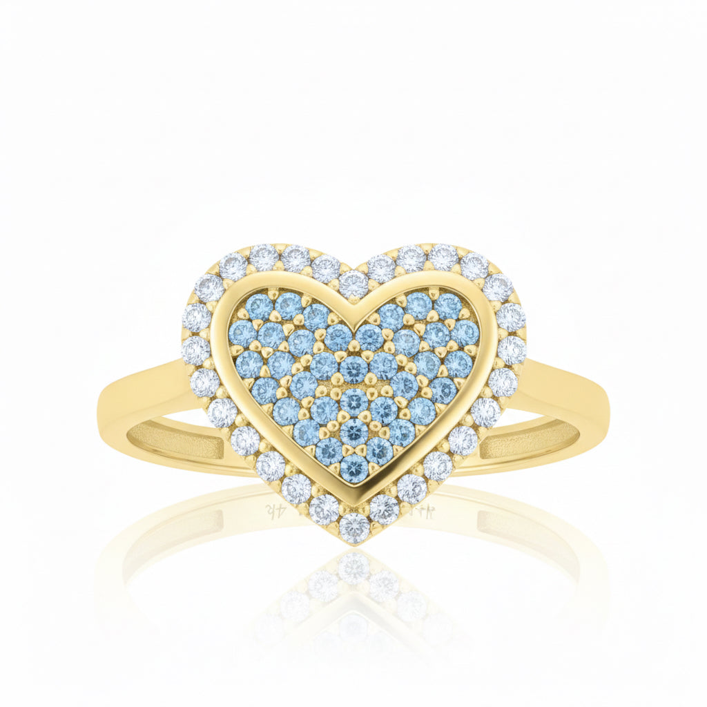 close up of 14k yellow gold heart ring blue and white cubic zirconia