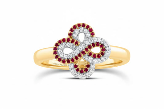 14k yellow gold infinity clover ring with 1/8 CTW diamonds and 1/6 CTW round ruby