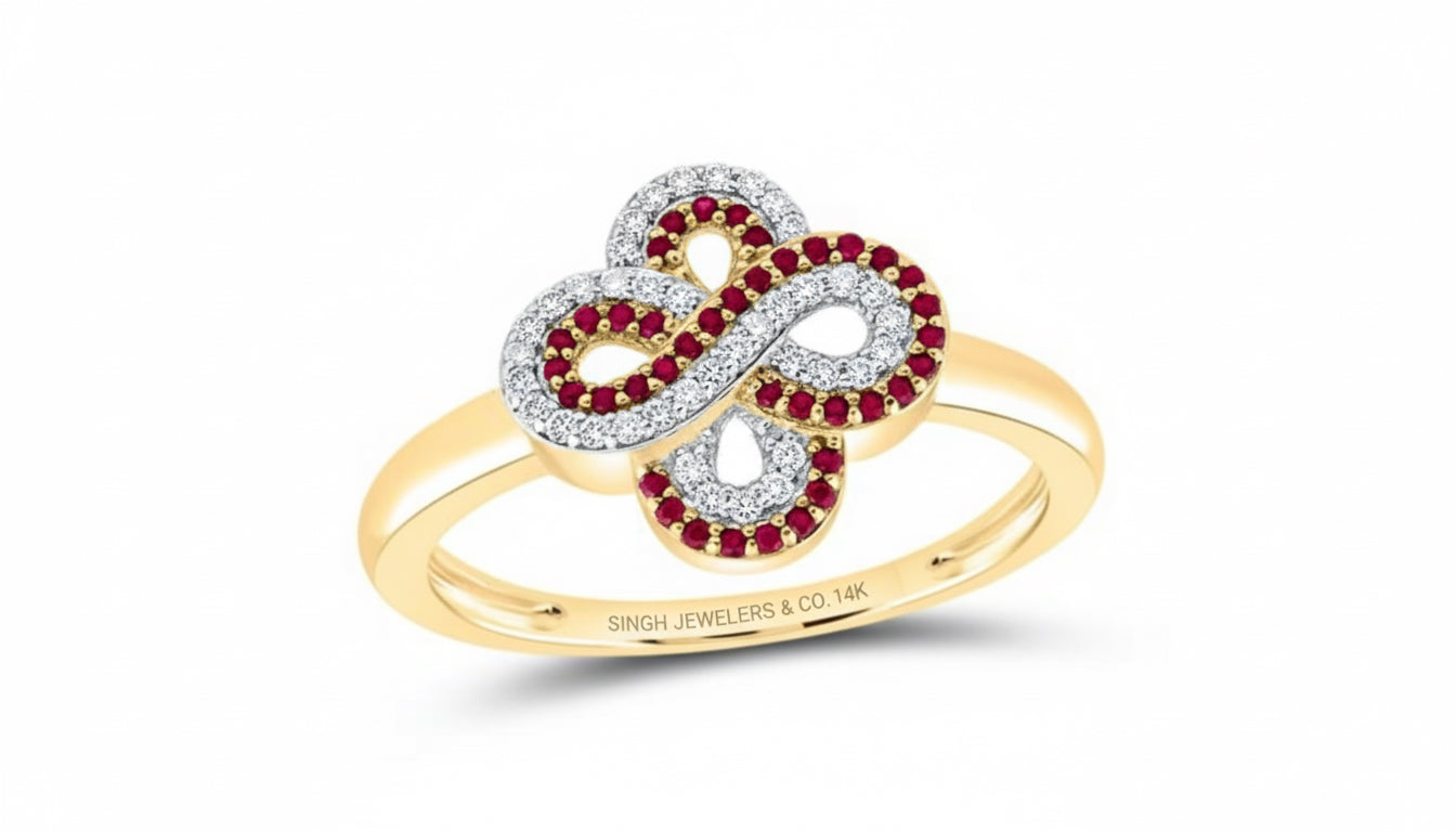 14k yellow gold infinity clover ring with 1/8 CTW diamonds and 1/6 CTW round ruby
