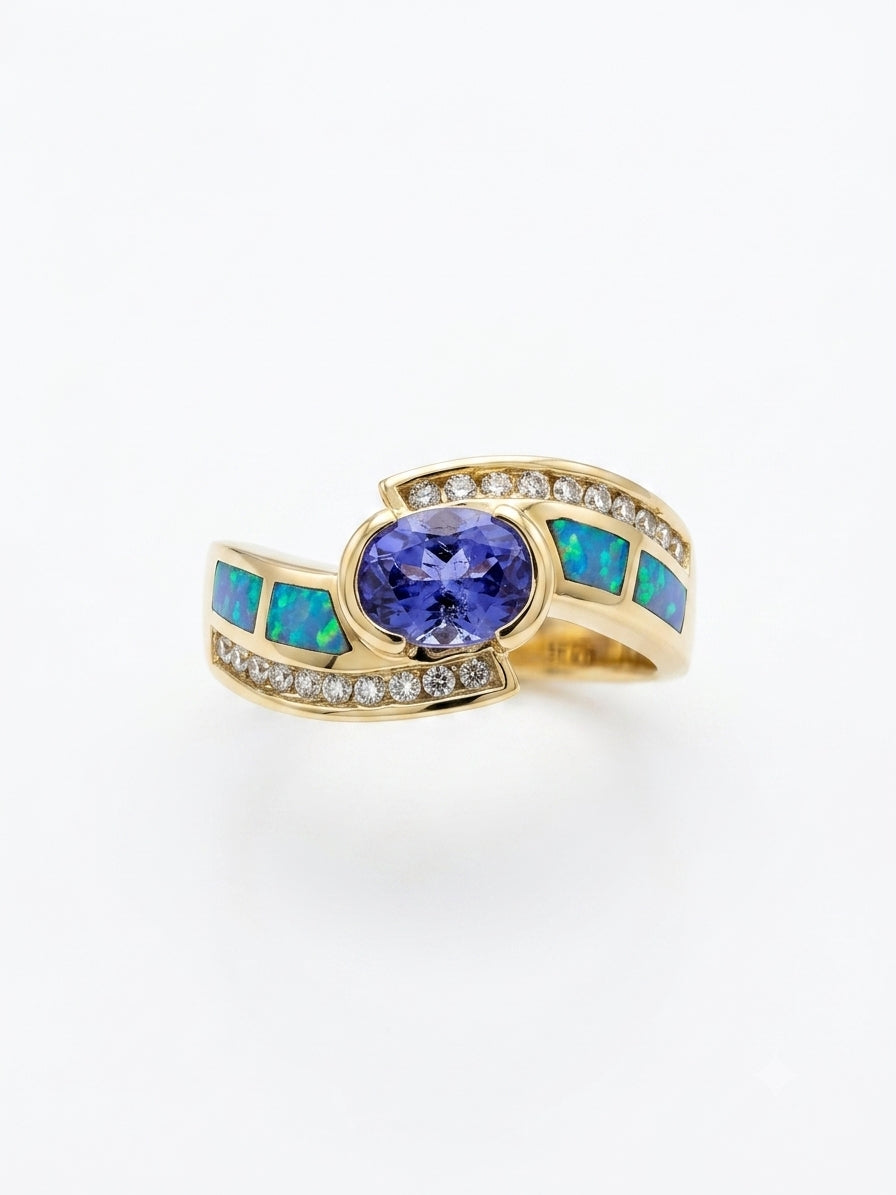 14K yellow gold ring featuring tanzanite, opal, and diamond gemstones