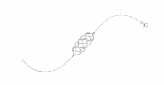 Silver bracelet with interlocking heart charms on a white background