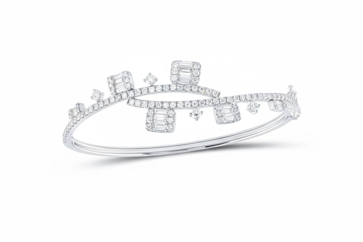 Silver tiara with embedded diamonds on a white background
