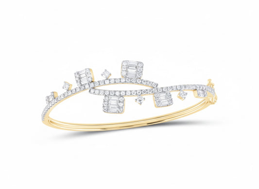 Gold and diamond bracelet on a white background