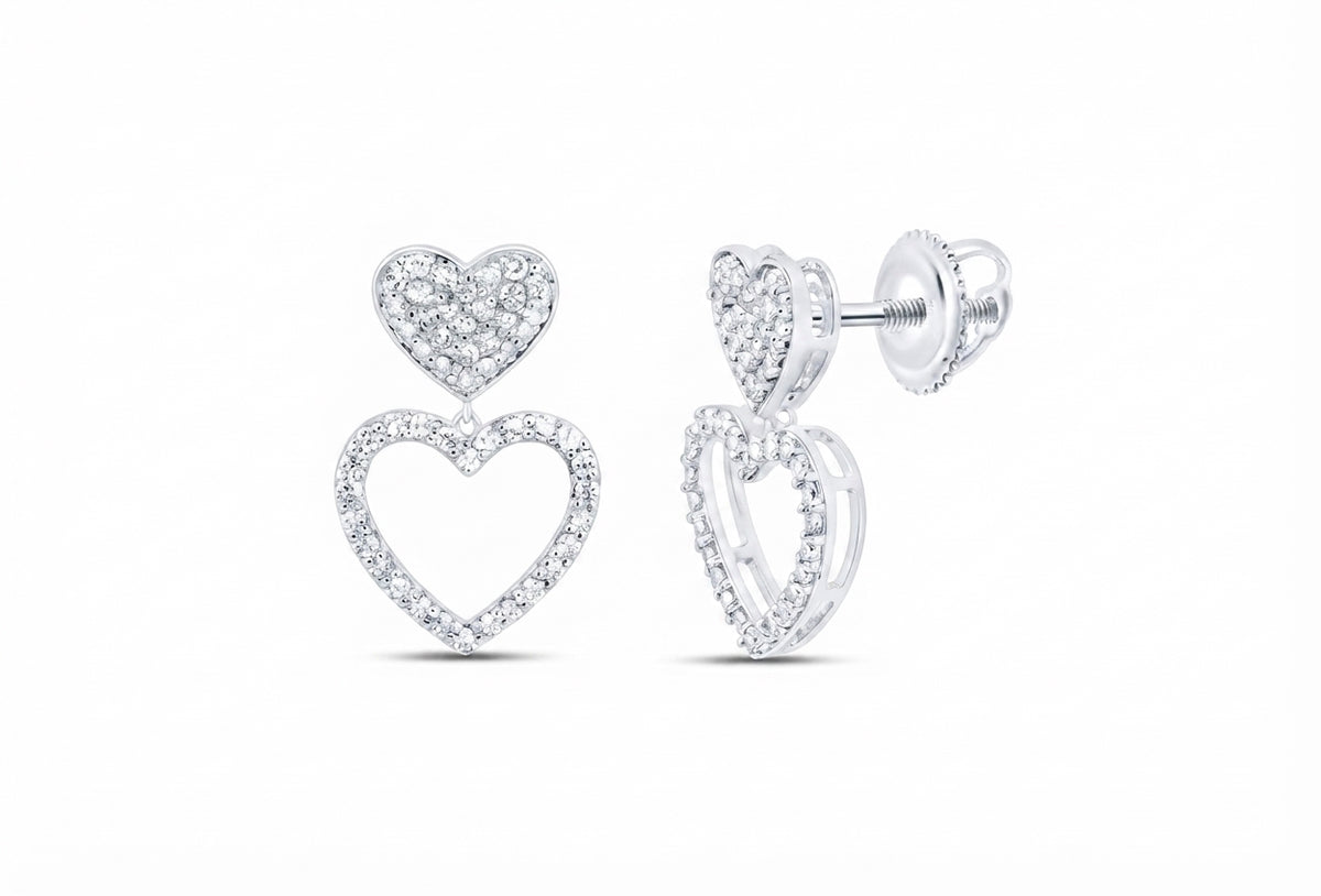 Elegant natural diamond heart dangle earrings crafted in 10K white gold. A timeless jewelry gift for anniversaries, birthdays and special moments.