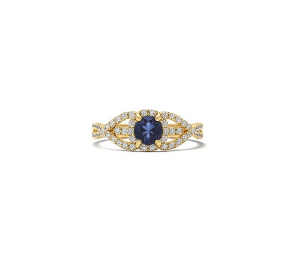 Gold ring with a blue gemstone on a white background
