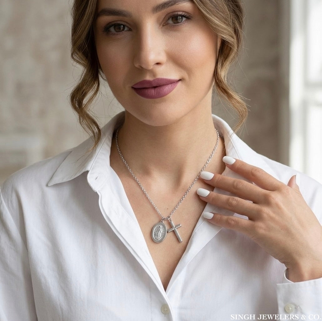 Woman wearing a 925 sterling silver Guadalupe necklace with cross pendant and 18-inch chain