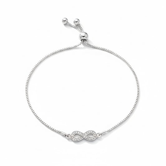 Silver bracelet with an infinity symbol on a white background