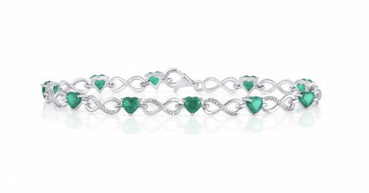 Sterling silver infinity bracelet with 5/8 CTW heart-shaped emerald-cut diamonds, prong-set, flawless clarity