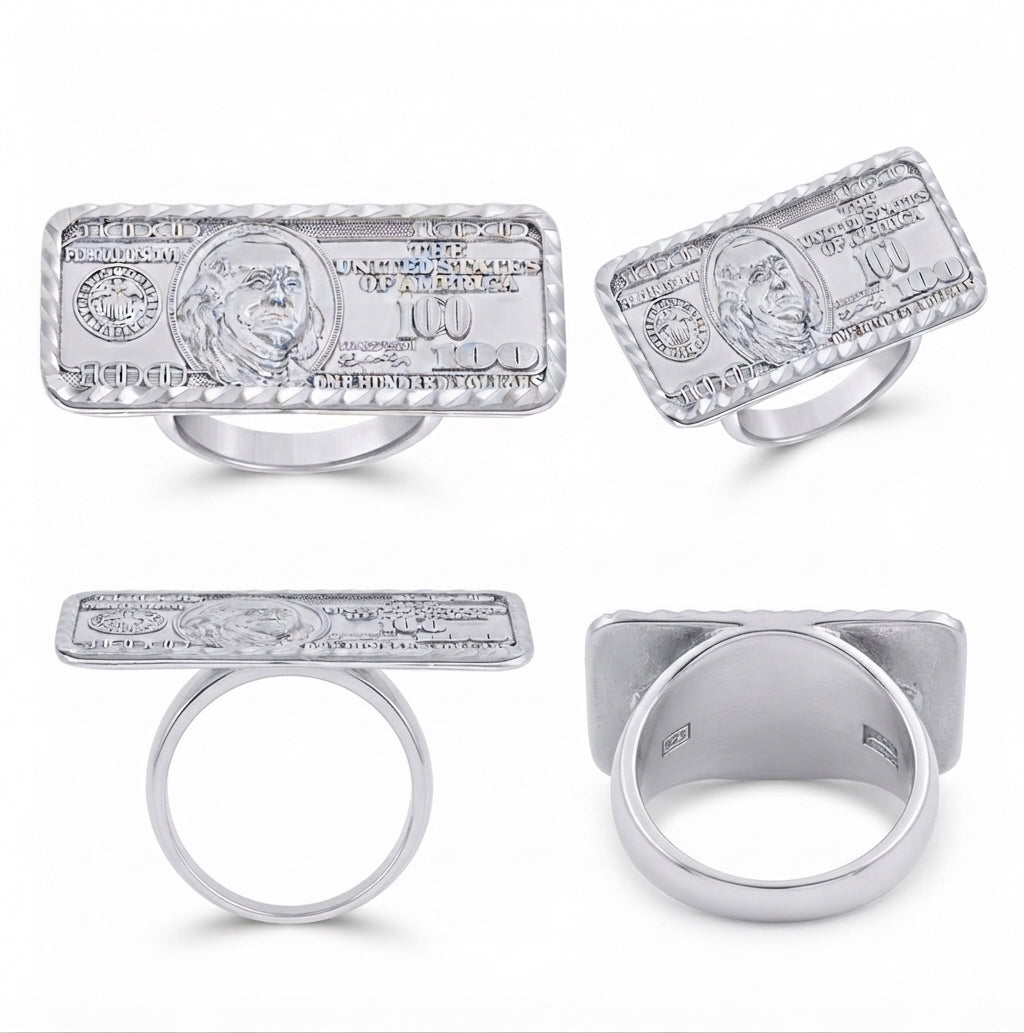 Four views of a silver ring designed to look like a 100 US dollar bill, showing the front, side, back, and inner band details on a white background.
