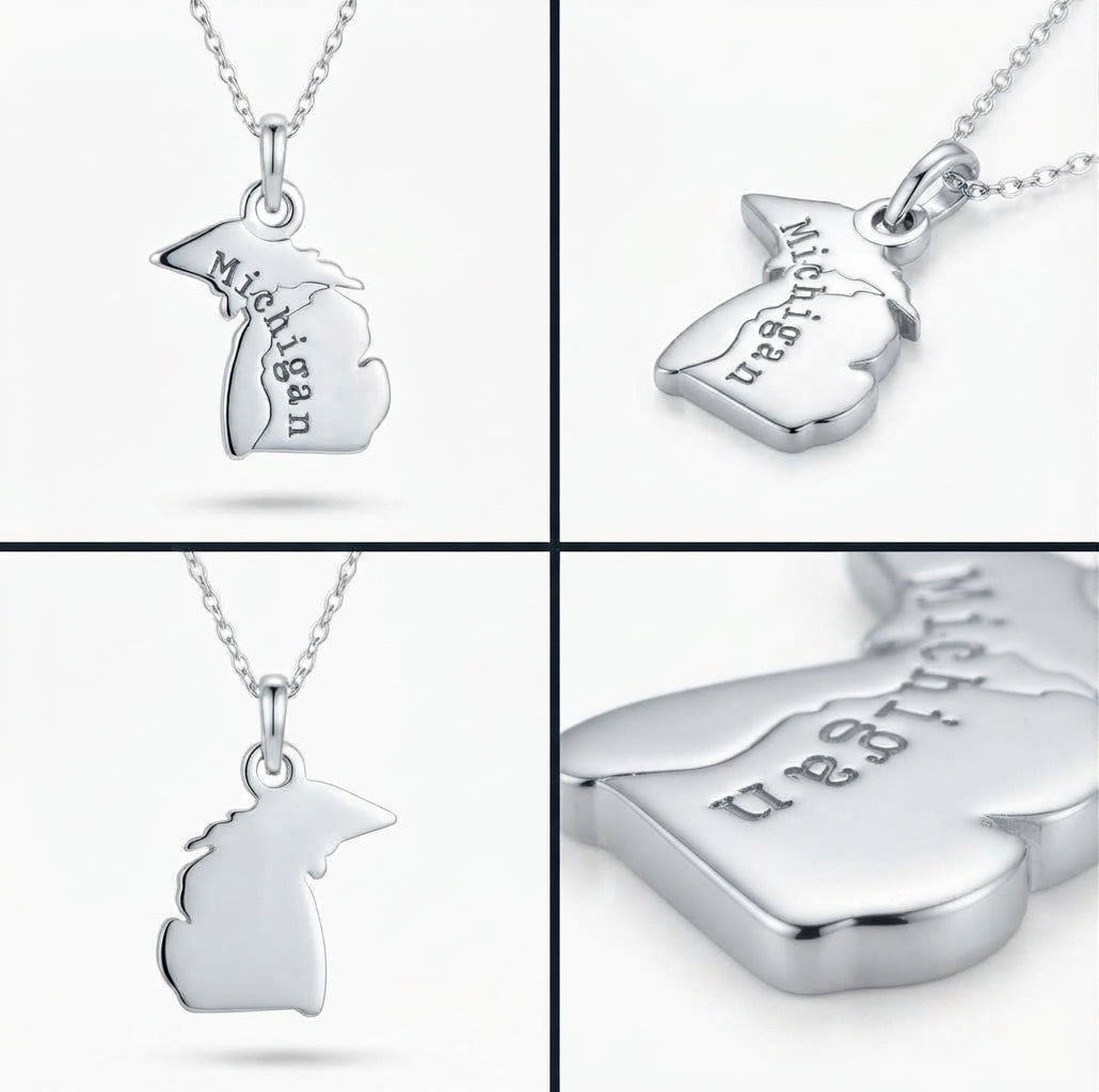 Close-up of sterling silver Michigan State charm pendant