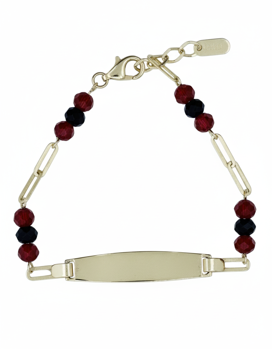 Bracelet with red and black beads and a gold clasp on a white background