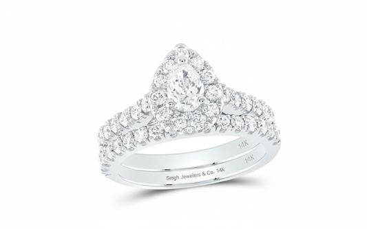 Diamond ring with 'Sigh Jewellers & Co.' engraving on a white background