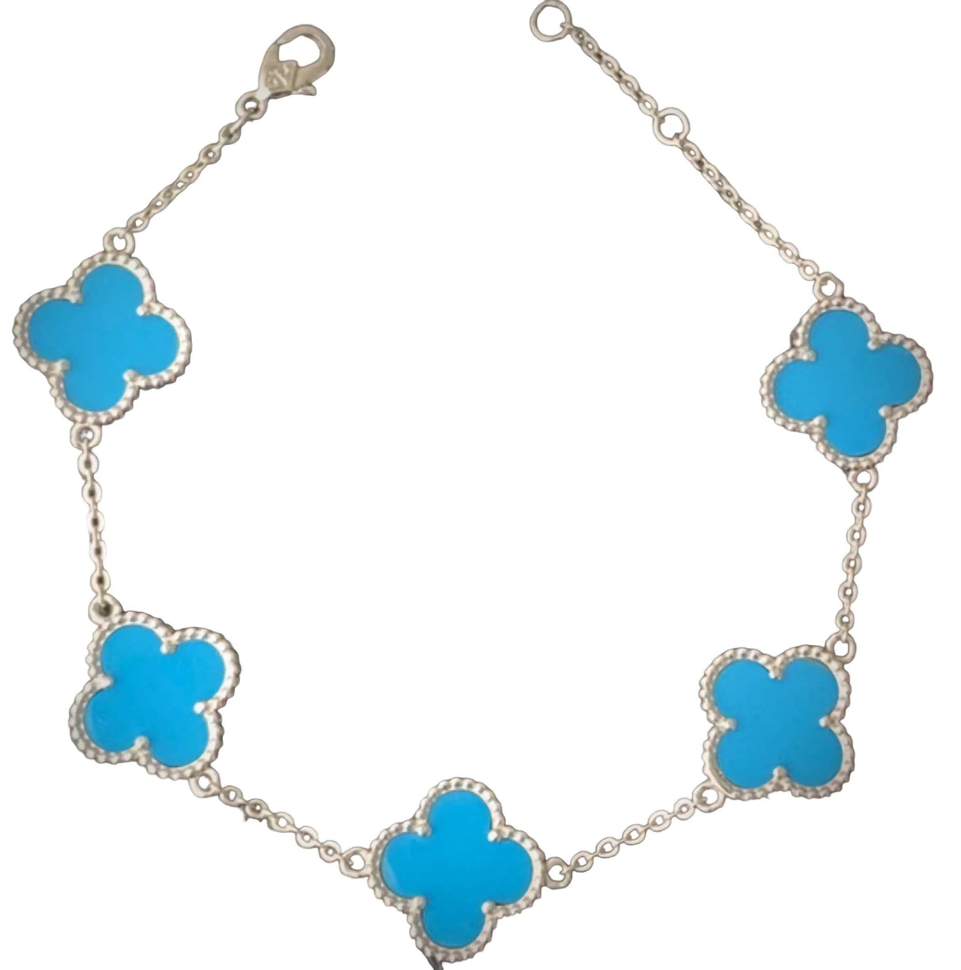 A stainless steel bracelet with four sky blue clover-shaped charms linked together with a chain design and a secure trigger clasp closure.