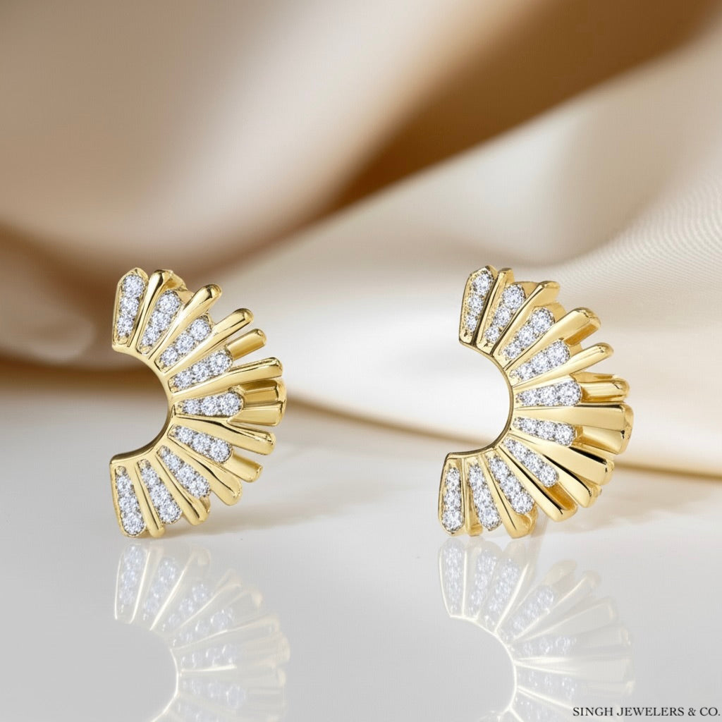 Close-up of ANA M diamond earrings in gold setting